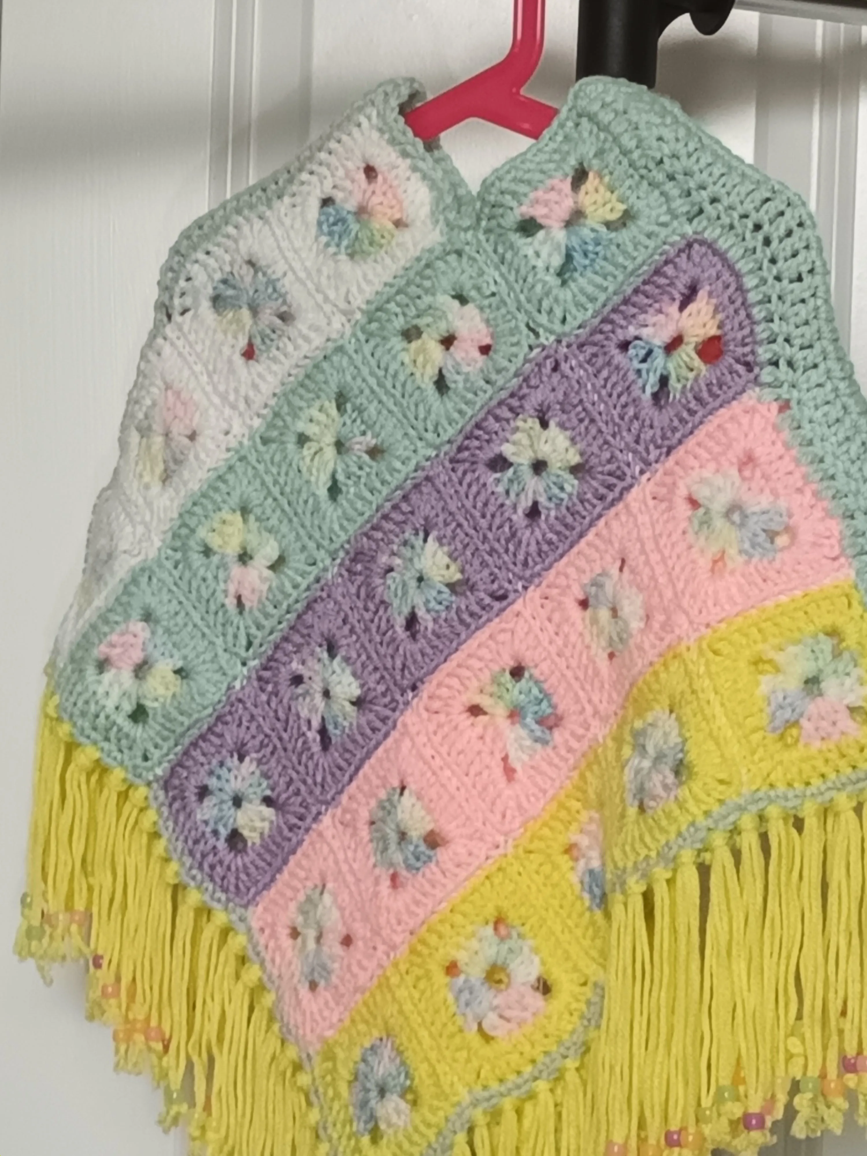 Child's Poncho in pastels size toddler